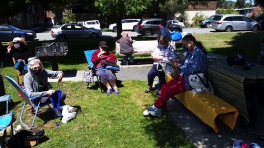 In July the Knitting Group met in Town Park across from the Post Office.